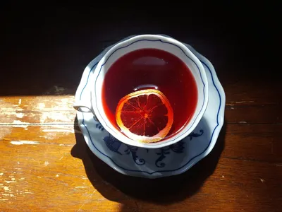 Glass of red hibiscus tea, a traditional remedy sometimes used for UTI prevention